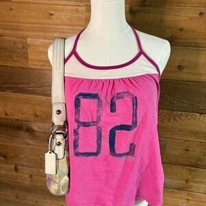 Y2K Women's Aerie pink and white halter top with a vintage vibe